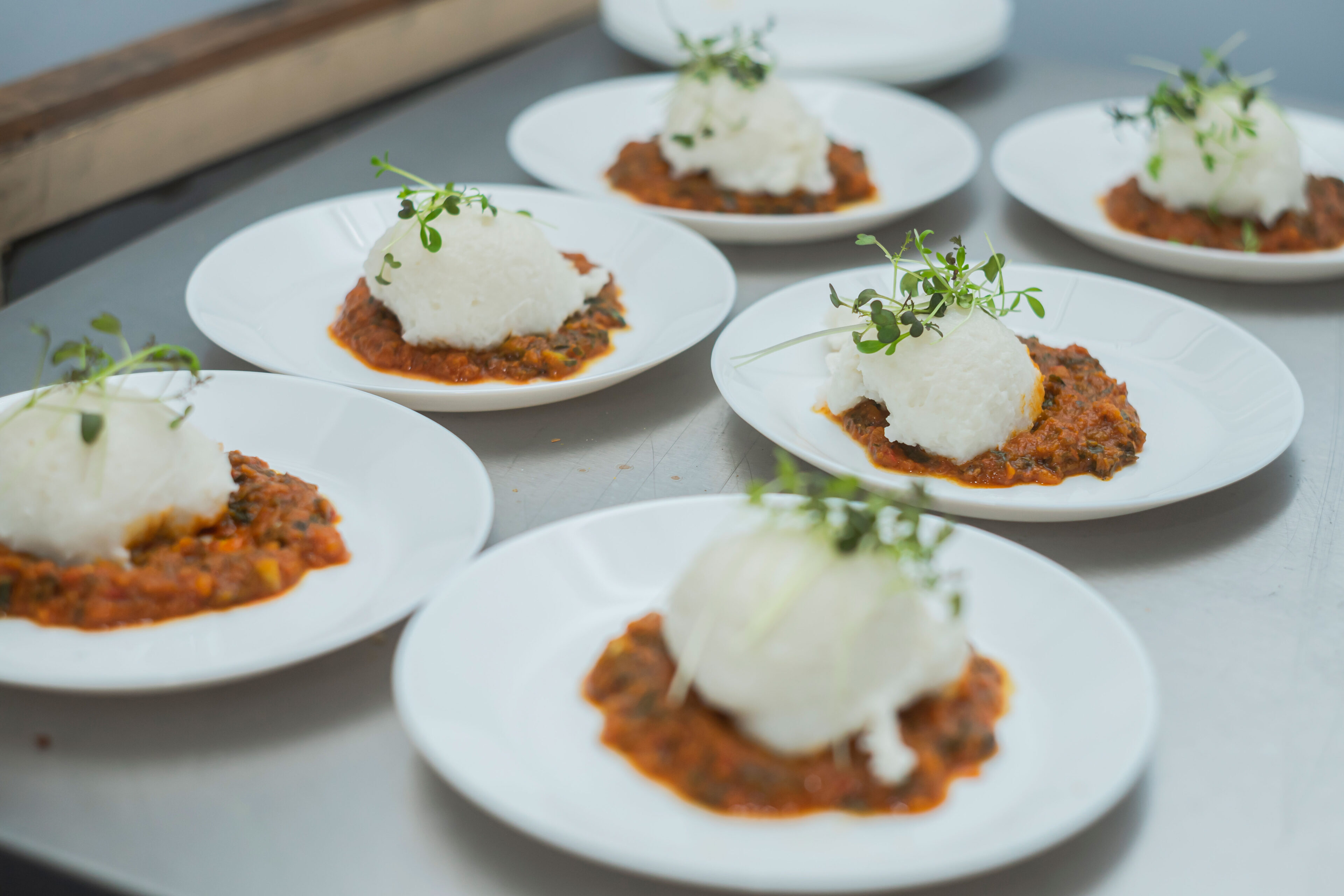 Multiple plates of delicious African cuisine